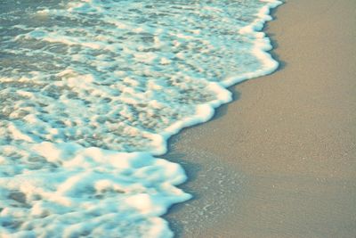 Close-up of water on beach