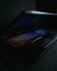 High angle view of illuminated laptop on table