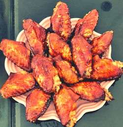 High angle view of meat on barbecue grill
