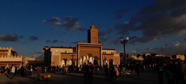 Low angle view of islamic mosque in city