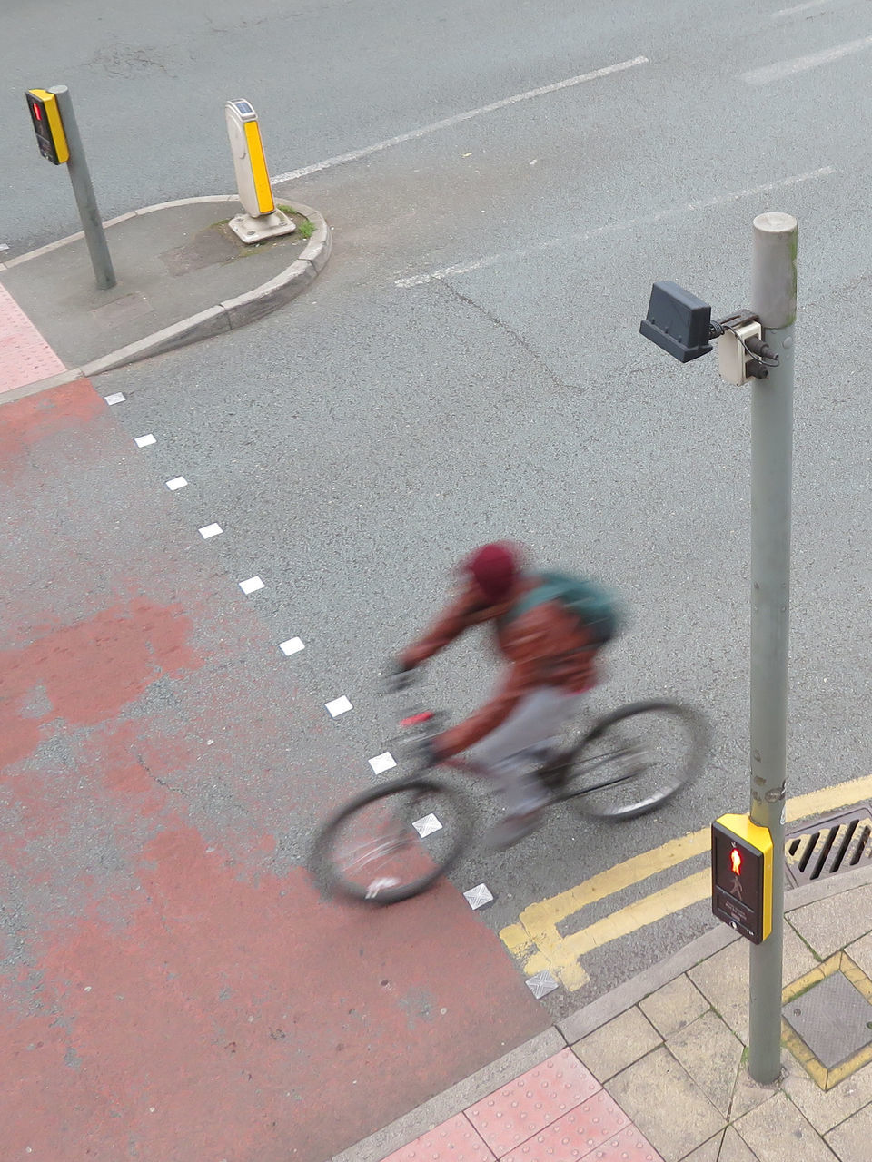 BLURRED MOTION OF BICYCLE ON ROAD