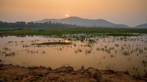 Scenic view of mountains at sunset