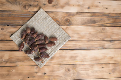 High angle view of bread on wooden table