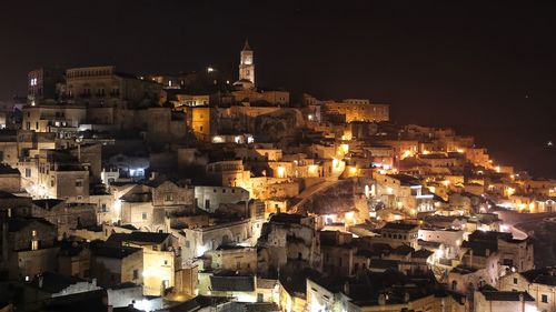 Aerial view of illuminated city at night