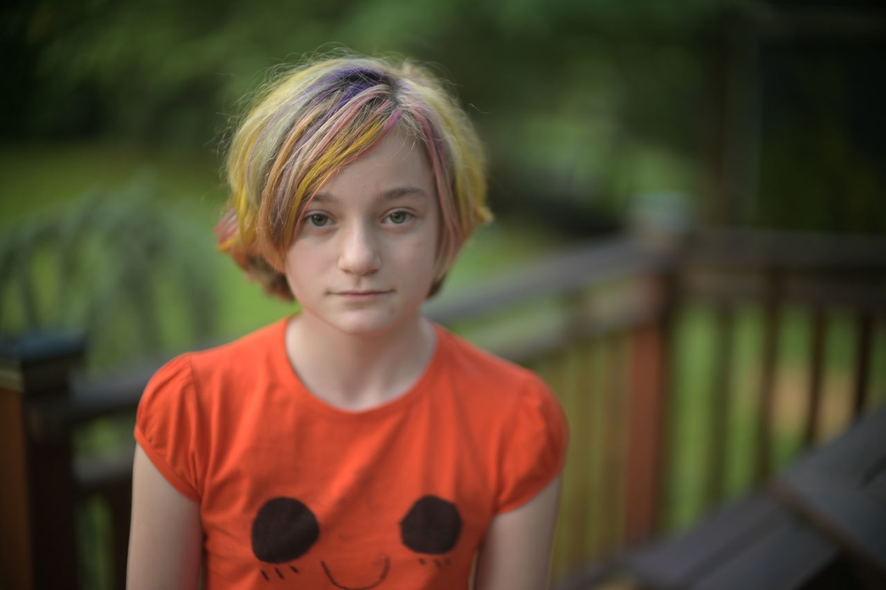 child, childhood, portrait, one person, looking at camera, front view, blond hair, person, men, innocence, casual clothing, focus on foreground, emotion, human face, standing, day, smiling, waist up, clothing, teenager, toddler, spring, outdoors, headshot, human hair, nature, yellow, leisure activity, lifestyles