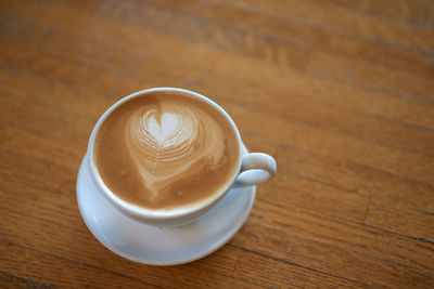 High angle view of cappuccino on table