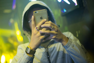 Close-up of hand holding smart phone