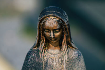 Close-up of woman looking at camera