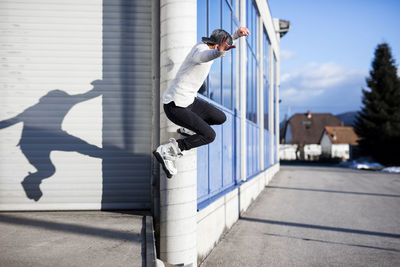 Young man doing a trick on inline skates