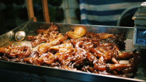 High angle view of meat on barbecue grill