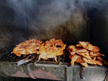 Chicken on barbeque grill