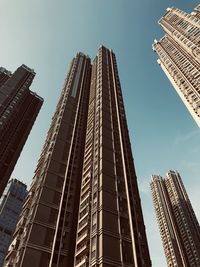 Low angle view of modern buildings against clear sky