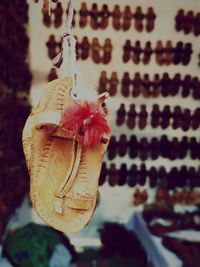 Close-up of clothes hanging on wall