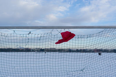 Close-up of red wall against sky