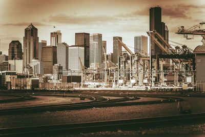 View of railroad tracks against cloudy sky