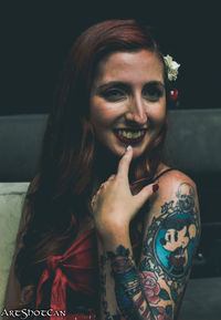 Portrait of smiling young woman