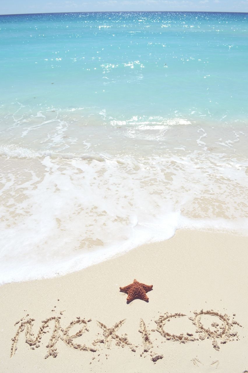 sea, beach, sand, horizon over water, shore, water, wave, surf, beauty in nature, tranquility, nature, scenics, tranquil scene, vacations, idyllic, day, outdoors, sky, coastline, sunlight