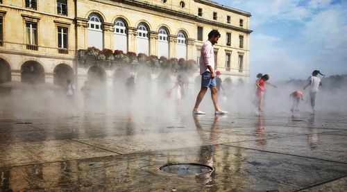 Group of people in front of building