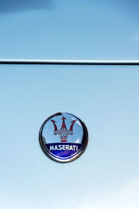 Low angle view of information sign against clear sky