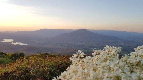 Scenic view of mountains against sky during sunset