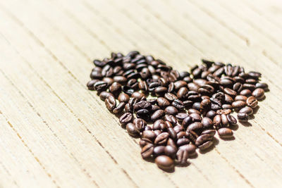 Close-up of coffee beans on table