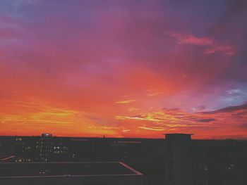 Cityscape against sky during sunset