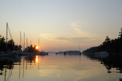 Silhouette of marina at sunset