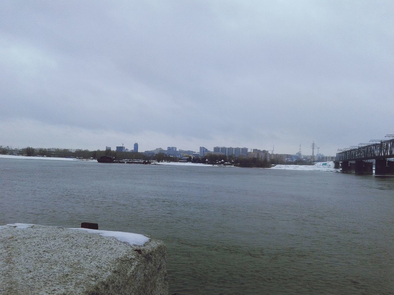 water, architecture, built structure, sky, building exterior, sea, waterfront, city, river, cloud - sky, transportation, nature, nautical vessel, day, outdoors, cloudy, no people, tranquility, harbor, rippled