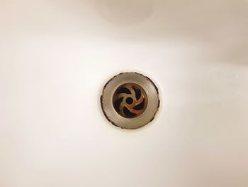 Close-up of faucet in bathroom