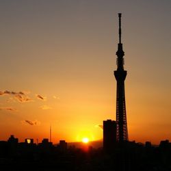 Silhouette of tower at sunset