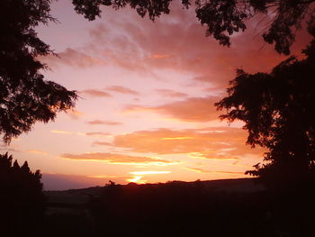 Scenic view of dramatic sky during sunset