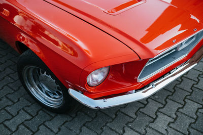 High angle view of red car on street