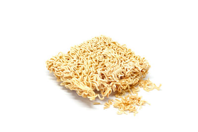 High angle view of pasta against white background