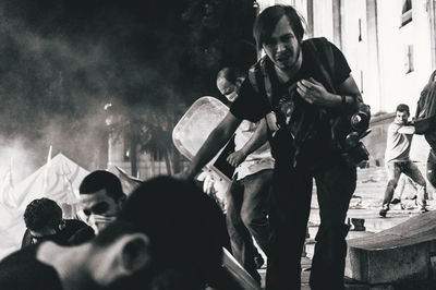 People photographing at night