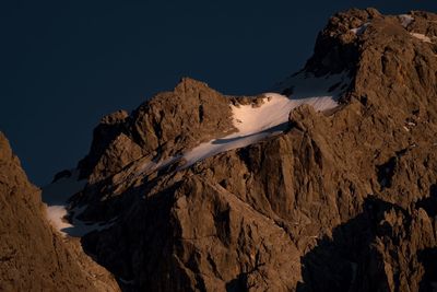 Panoramic view of mountains against clear sky