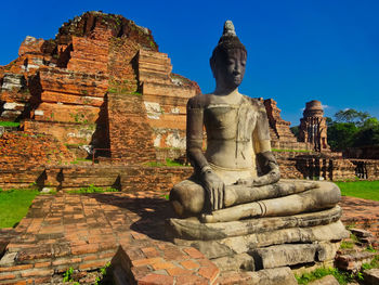 Statue of temple in building