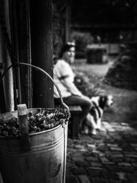 Midsection of man having food in potted plant