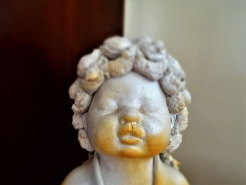 Close-up of figurine on table