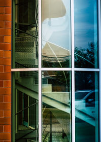 Reflection of building on glass window