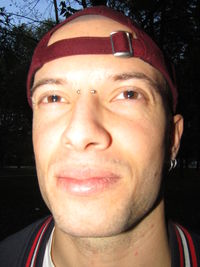 Close-up portrait of a smiling young man