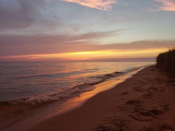 Scenic view of sea against sky during sunset