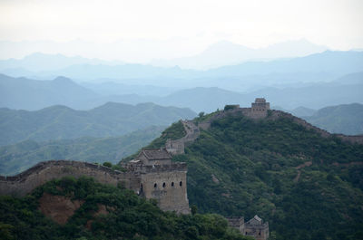 High angle view of great wall of china against mountains