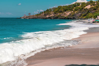 Scenic view of beach against sky