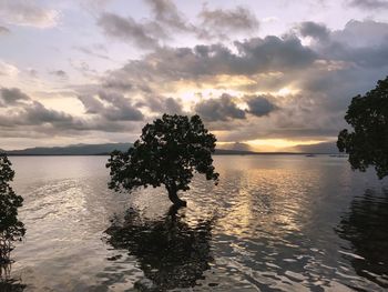 Scenic view of sea against sky at sunset