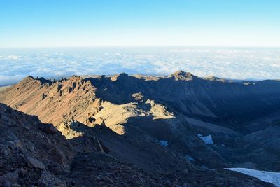 Volcanic rock formations above the clouds at mount kenya national park, kenya