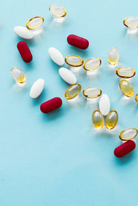 Close-up of pills on white background