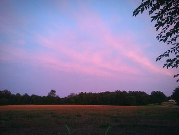 Scenic view of landscape at sunset