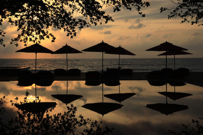 Scenic view of sea against sky during sunrise