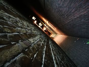 Low angle view of illuminated ceiling