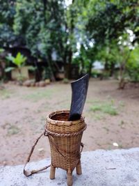 Close-up of wicker basket on table